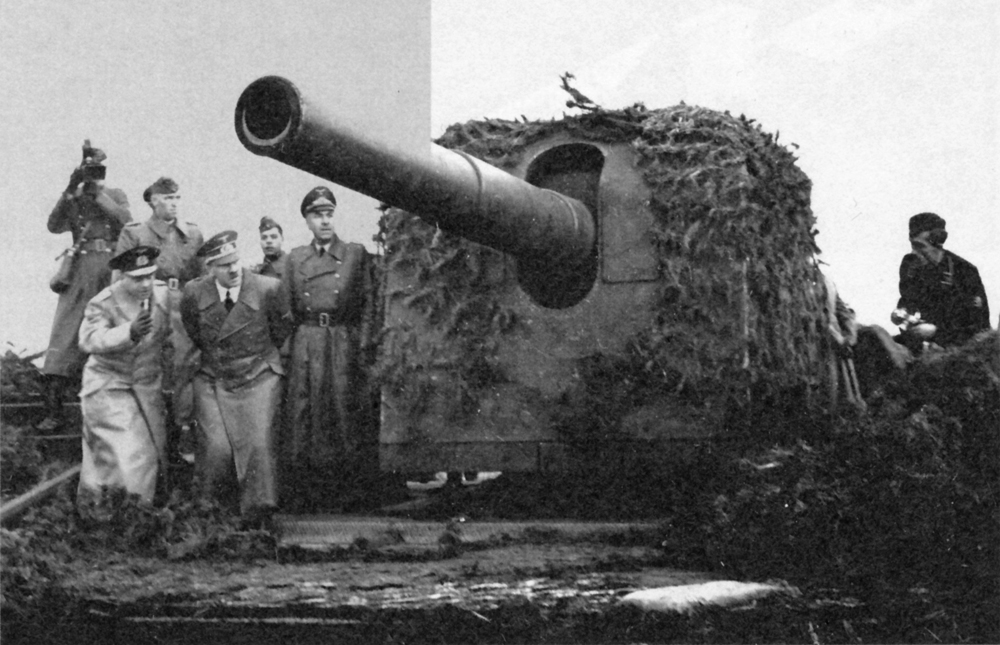 Adolf Hitler inspects a cannon in La Sence, France